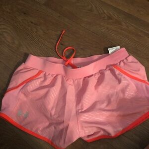 Under Armour pink running shorts